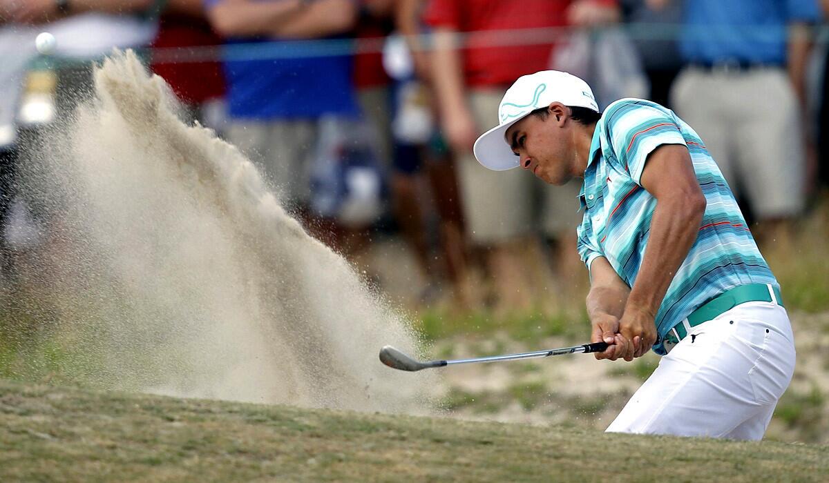 Ricky Fowler hits out of a trap at the 11th hole during the third round of the U.S. Open on Saturday at Pinehurst.