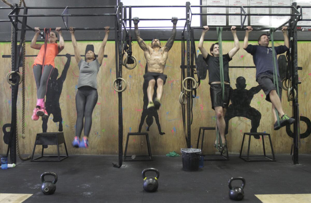 This is a CrossFit class at Cave Cross Fit. The competitive version of the workout regime is called Grid.