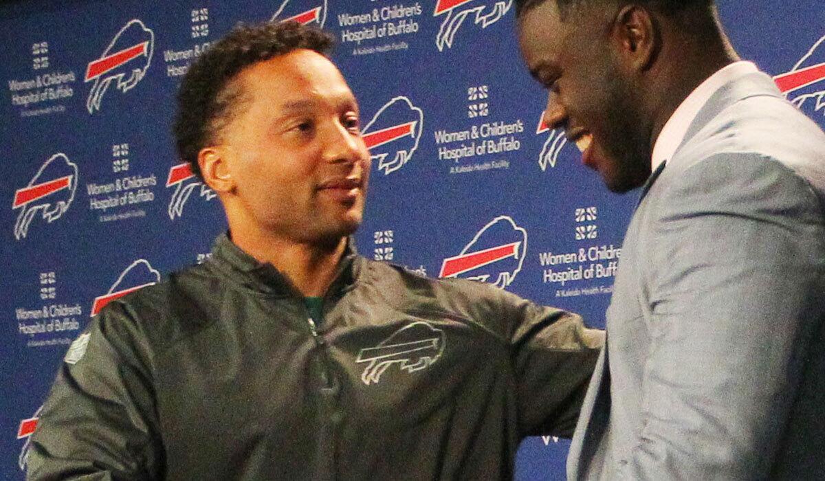 Buffalo Bills General manager Doug Whaley greets first-round draft pick Shaq Lawson on April 29.