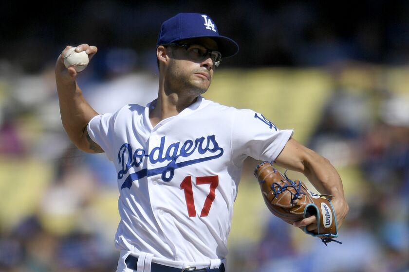 LOS ANGELES, CA - AUGUST 04: Joe Kelly #17 of the Los Angeles Dodgers pitches against the San Diego Padres in the seventh inning at Dodger Stadium on August 4, 2019 in Los Angeles, California. Dodgers won 11-10. (Photo by John McCoy/Getty Images)