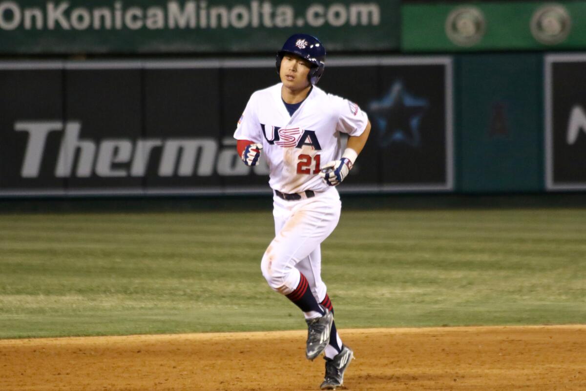 UC Irvine outfielder Keston Hiura rounds the bases after hitting a home run while playing for the Collegiate National Team in an exhibition at Angel Stadium on June 30, 2016.
