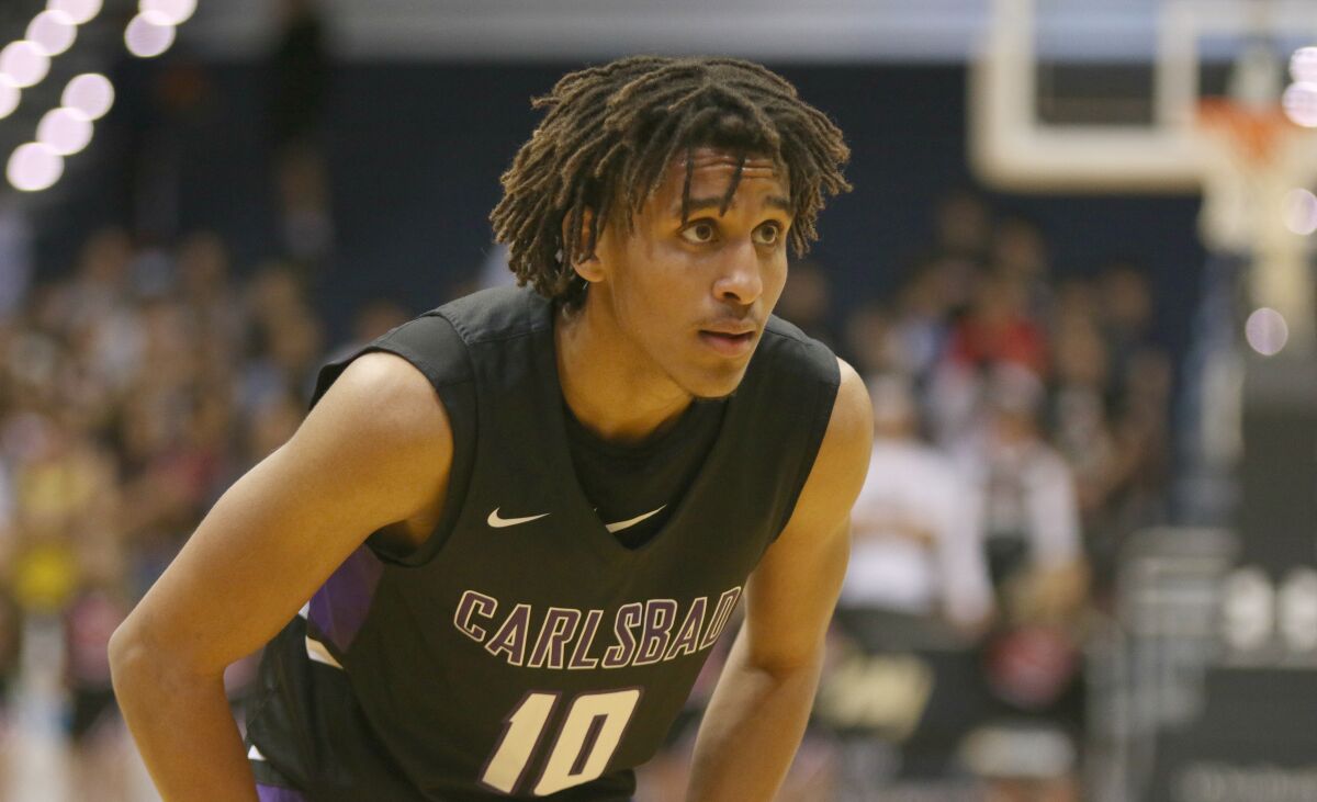 Lightning quick senior Jailen Nelson had a game high 26 pts. for Carlsbad.