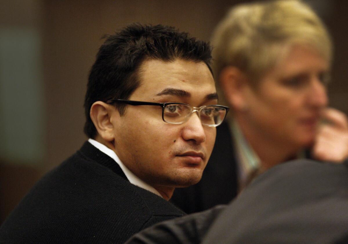 Iftekhar Murtaza, seen here in court in 2013, was sentenced to death for killing his ex-girlfriend's father and sister and setting their Anaheim Hills home on fire.