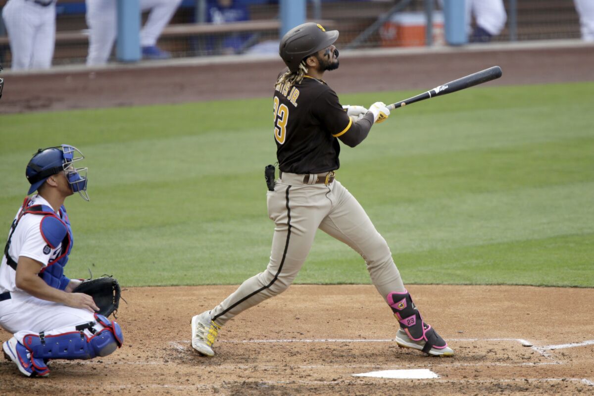 Padres shortstop Fernando Tatis Jr. hits a home run against the Dodgers last April.