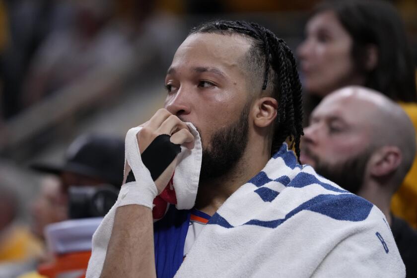 New York Knicks guard Jalen Brunson sits on the bench during the second half of Game 6 against the Indiana Pacers in an NBA basketball second-round playoff series, Friday, May 17, 2024, in Indianapolis. The Pacers won 116-103. (AP Photo/Michael Conroy)