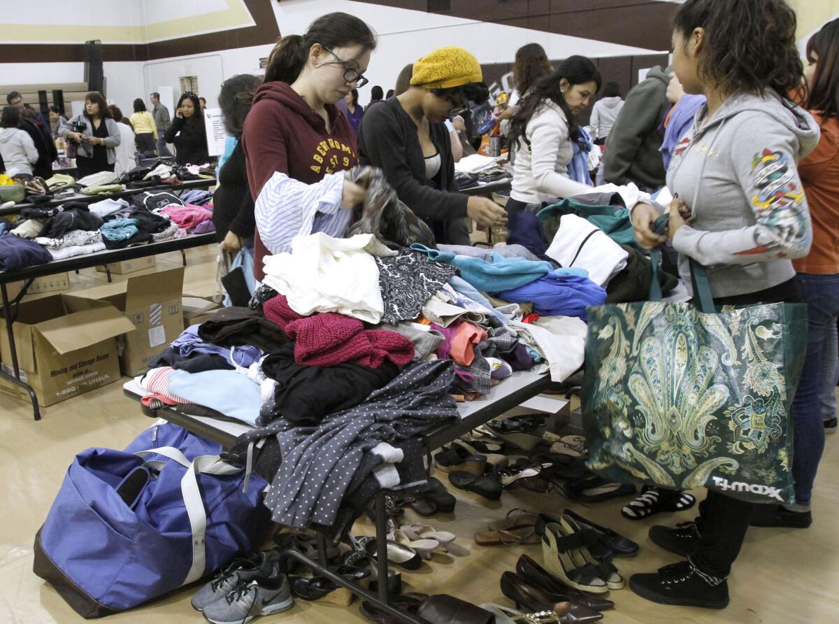 Large crowds attended the St. Francis High School yard sale at the school's gym in La Cañada Flintridge on Saturday, March 29, 2014.