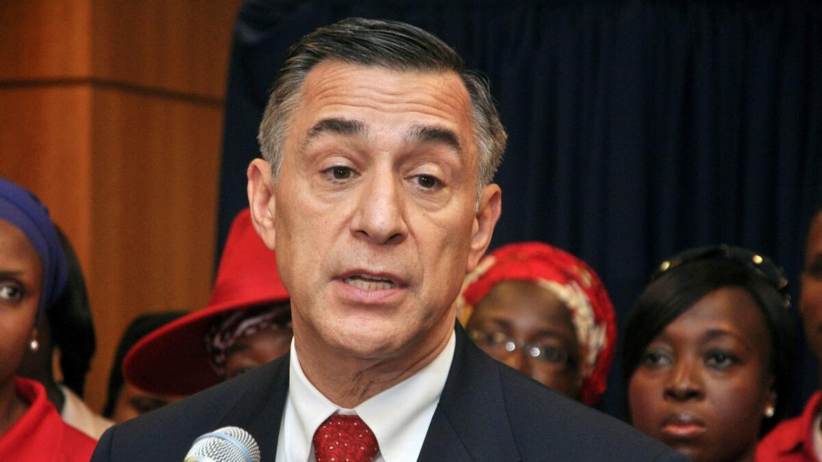 In this Aug. 4, 2015 file photo, U.S. Rep. Darrell Issa, R-Calif., speaks at a news conference at the U.S embassy in Abuja, Nigeria.