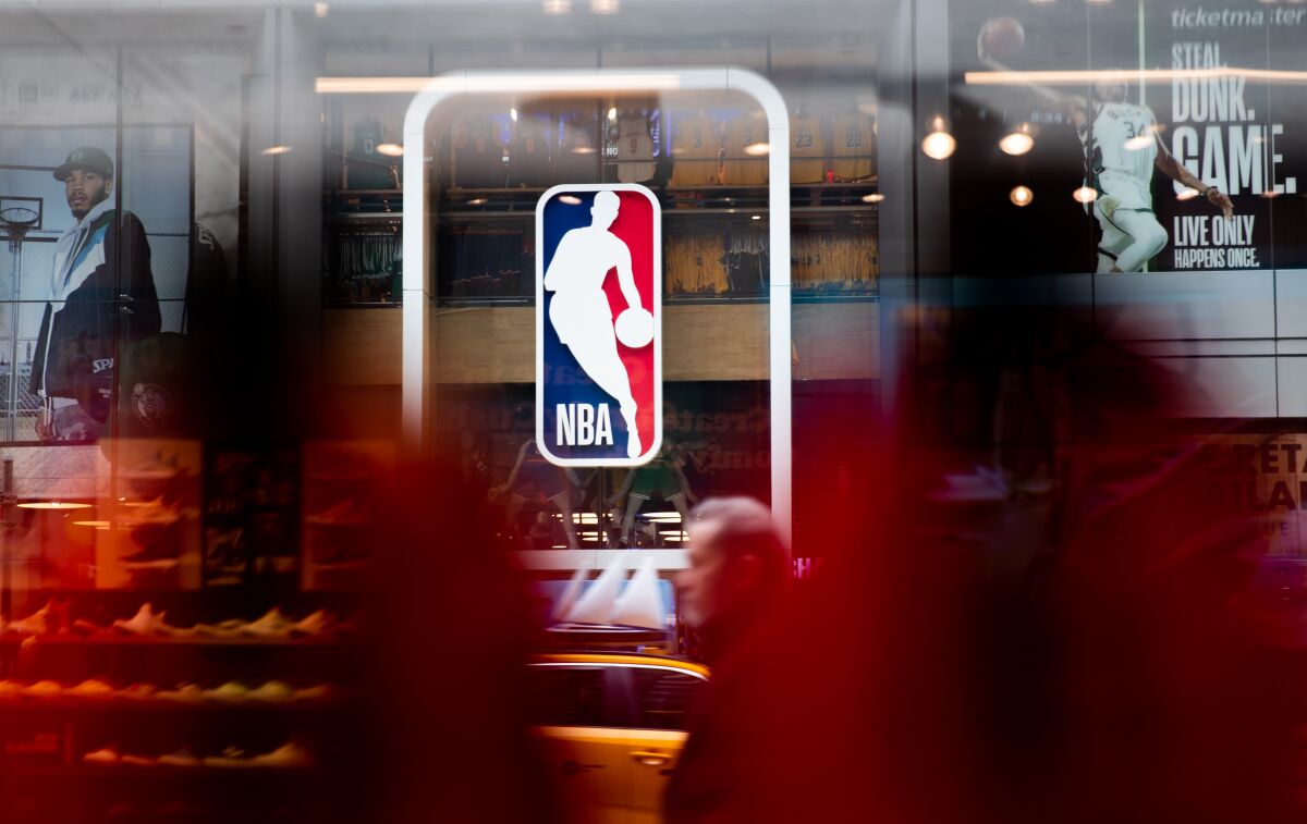An NBA logo is shown at the 5th Avenue NBA store in New York City. 