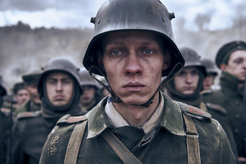 This image released by Netflix shows Felix Kammerer in a scene from "All Quiet on the Western Front." (Reiner Bajo/Netflix via AP)