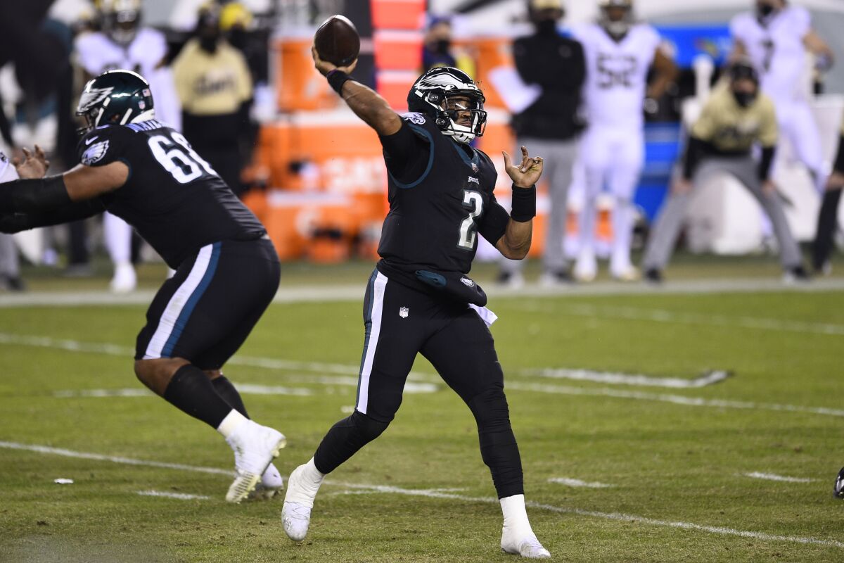 Philadelphia Eagles quarterback Jalen Hurts throws against the New Orleans Saints.