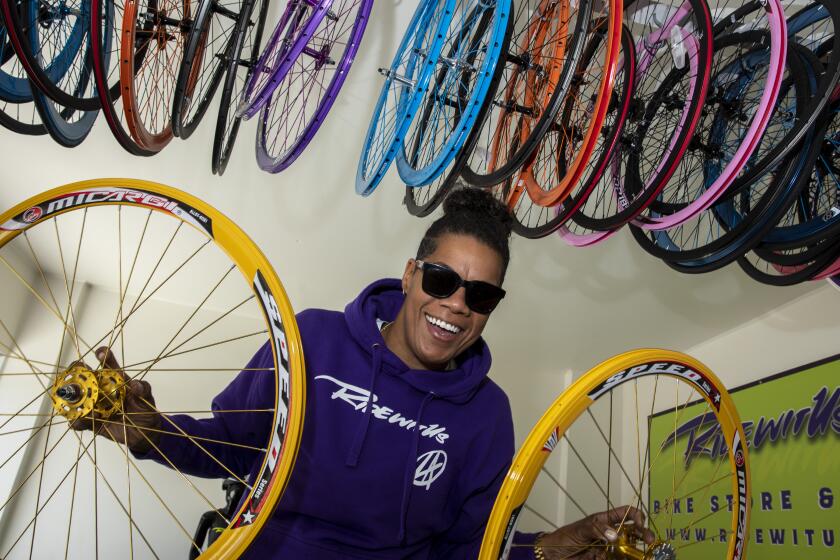 LOS ANGELES, CA - MAY 18: Kellie Hart at her Slauson Ave. bike shop 'Ridewitus' on Tuesday, May 18, 2021 in Los Angeles, CA. Hart started a bike club to relieve stress brought on by the COVID-19 pandemic. One year later, her club has grown to a full-fledged bike shop. (Brian van der Brug / Los Angeles Times)