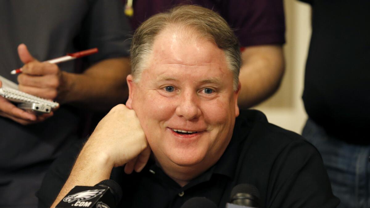 Philadelphia Eagles Coach Chip Kelly smiles as he listens to a question during a news conference at the NFL annual meeting in Phoenix on March 25, 2015.