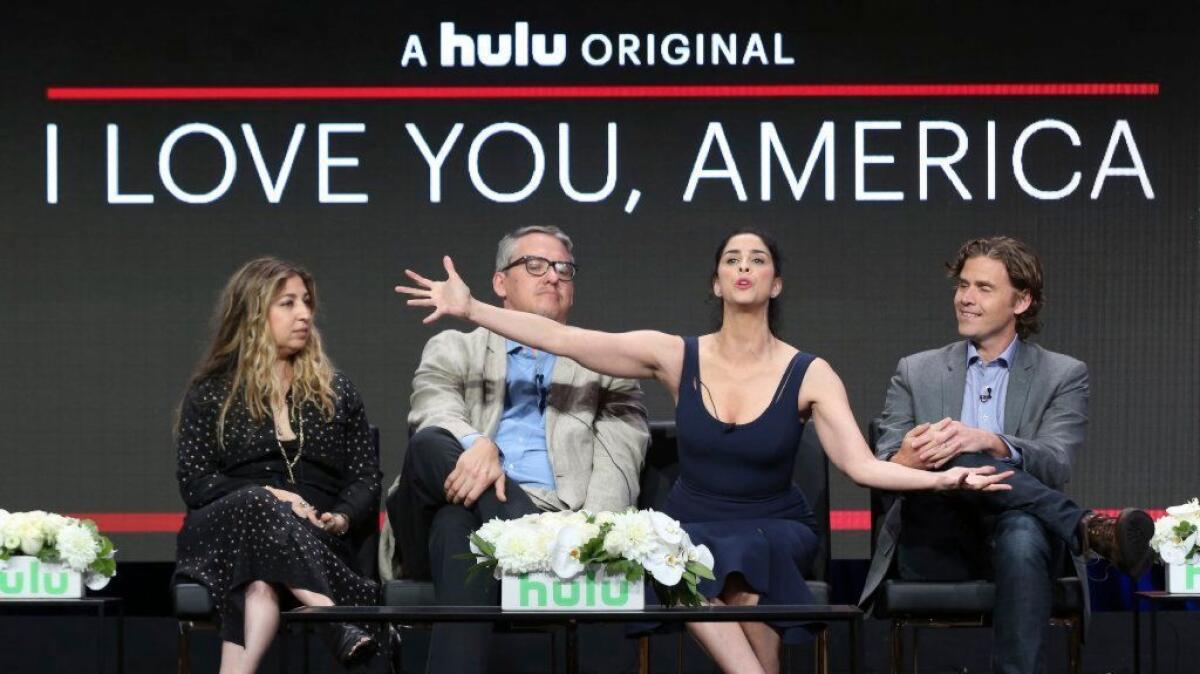 Executive producers Amy Zvi, left, and Adam McKay, star/executive producer Sarah Silverman and executive producer Gavin Purcell at Hulu's "I Love You, America" panel at the TCA summer press tour.