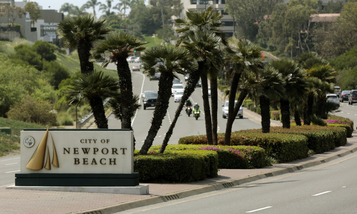 A sign welcomes visitors to Newport Beach.