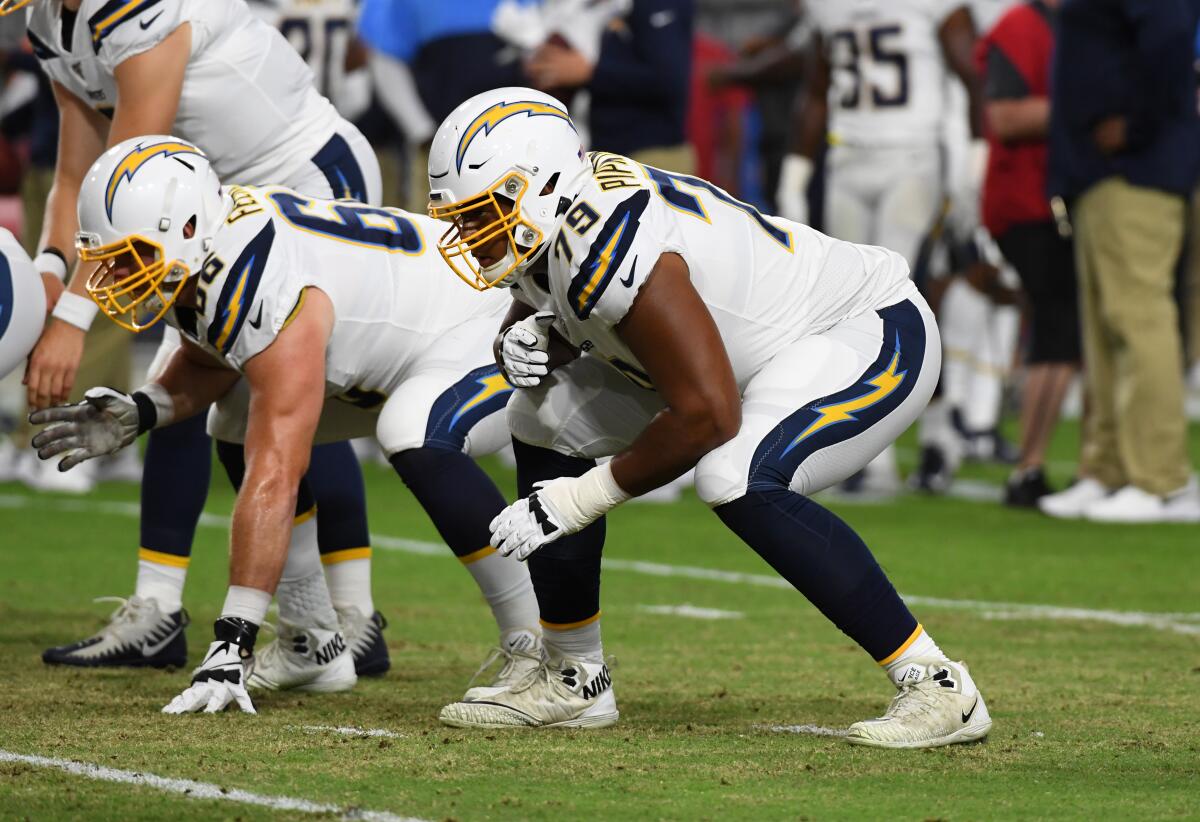 Chargers offensive lineman Trey Pipkins warms up before a preseason game against the Arizona Cardinals in August.