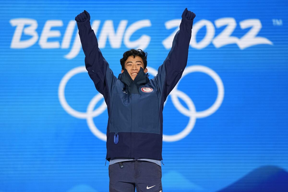 U.S. gold medalist Nathan Chen celebrates during the medal ceremony for the men's free skate figure skating.
