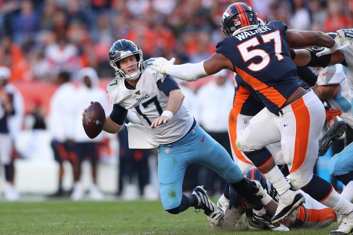 Tennessee Titans quarterback Ryan Tannehill is sacked by the Denver Broncos on Sunday.