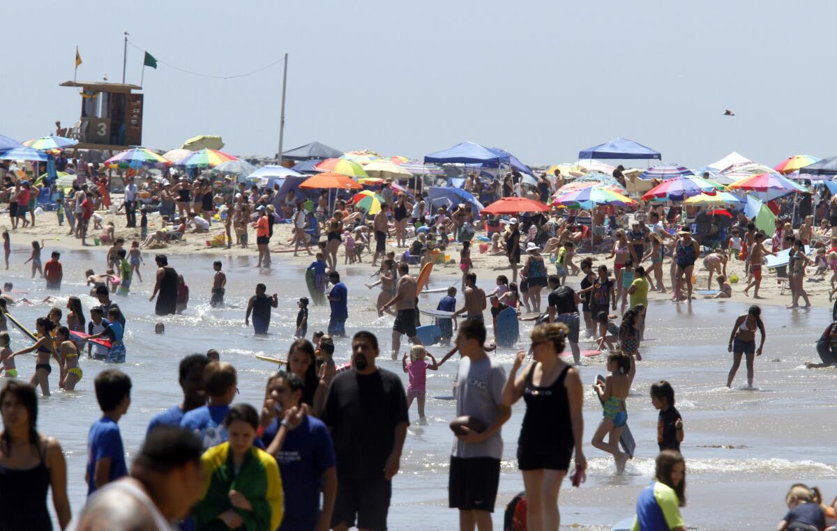 The beaches in Corona del Mar draw crowds during summer months.