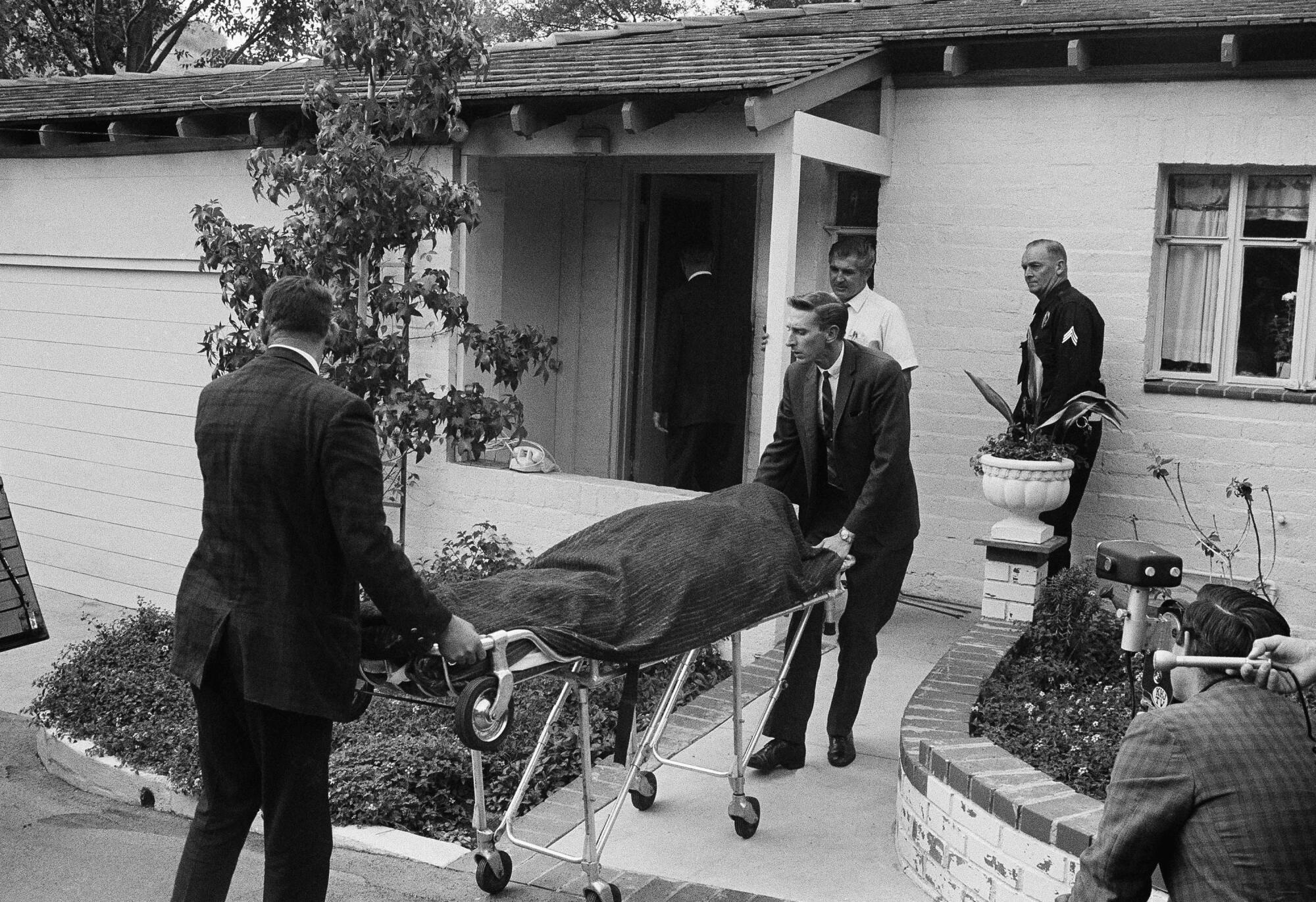 The body of silent screen actor Ramon Novarro is wheeled from his Laurel Canyon home on Oct. 31, 1968.