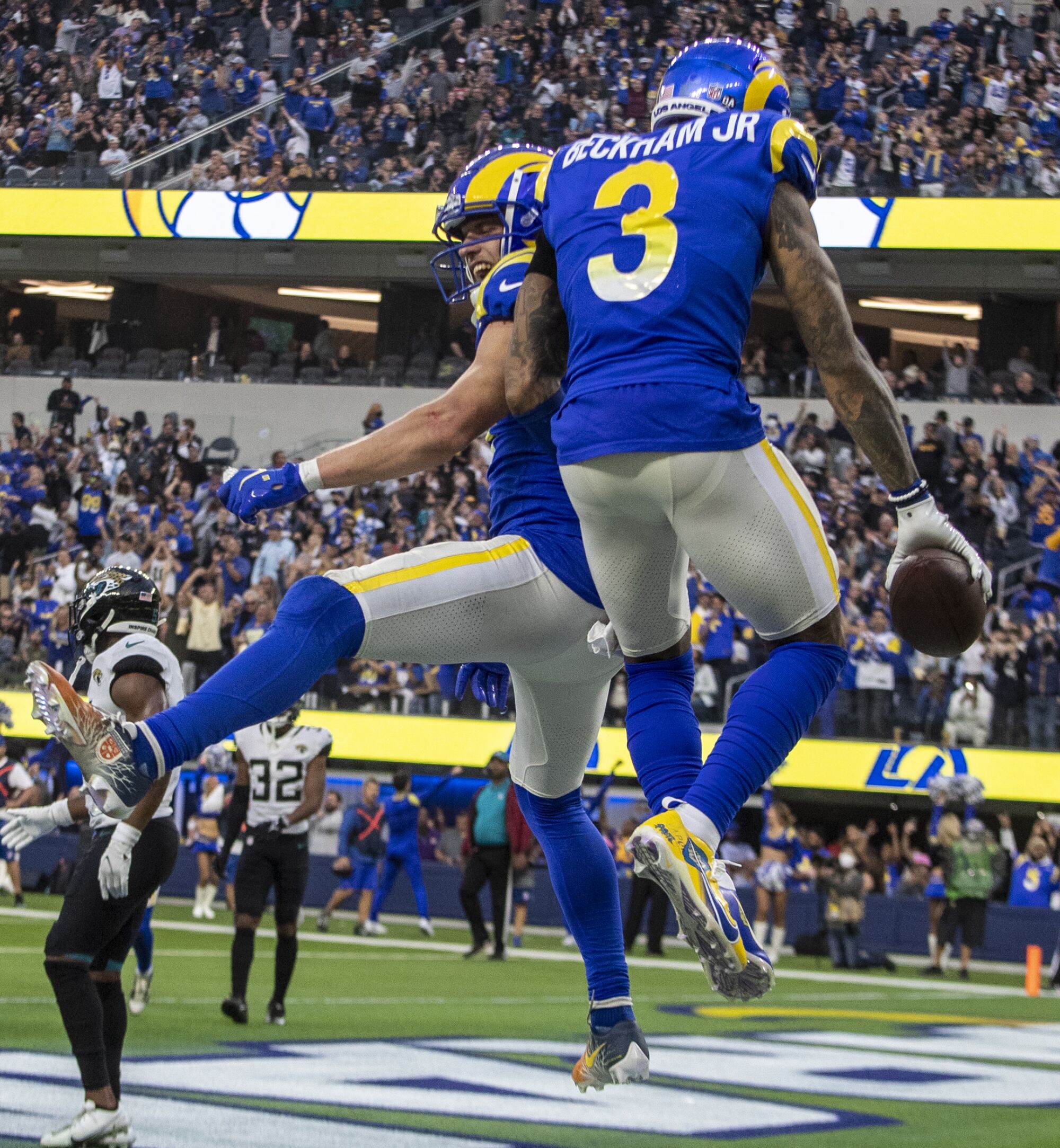 Rams wide receiver Odell Beckham Jr. celebrates his touchdown catch with teammate Cooper Kupp.