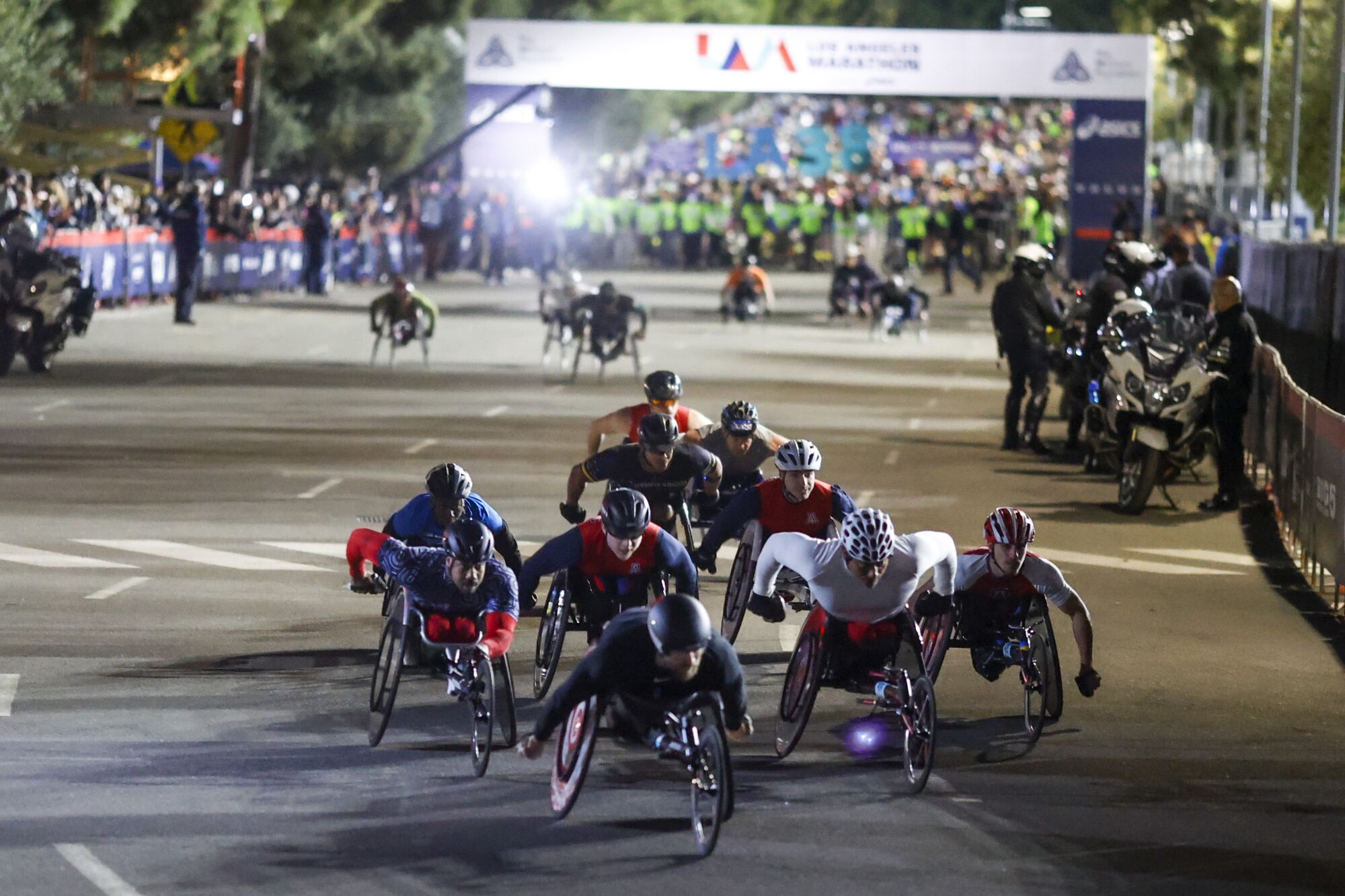 Wheelchair athletes start the L.A. Marathon.