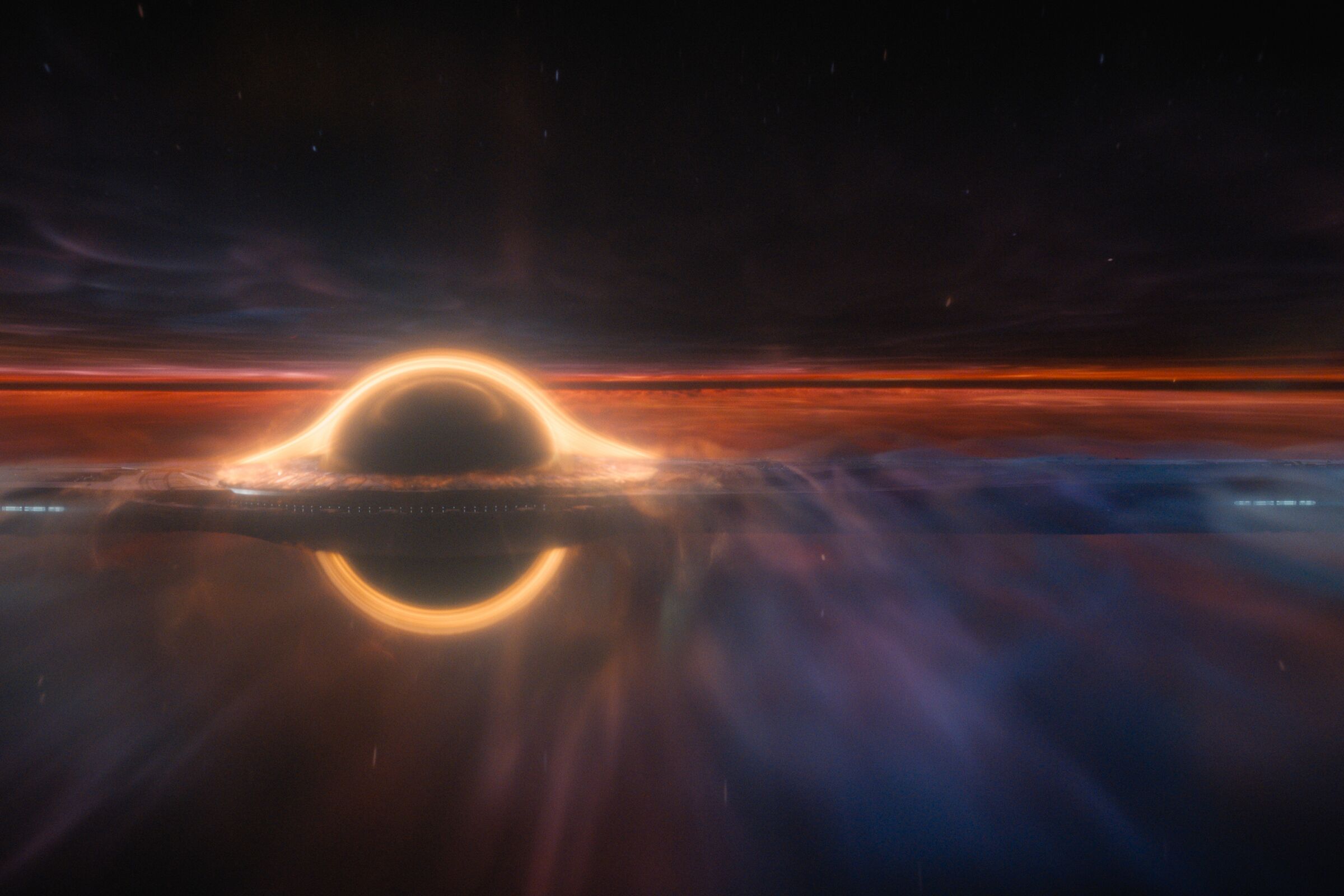 An outer space scene with clouds and a bright ring of light from "Foundation."