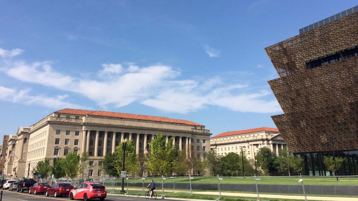 Adjaye's museum faces the neoclassical Herbert Hoover Department of Commerce Building, which was completed in 1932.