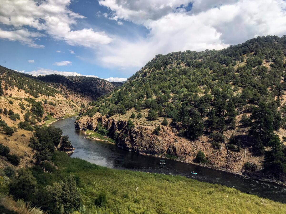 The California Zephyr passes through wild stretches of the Rocky Mountains along the Colorado River.