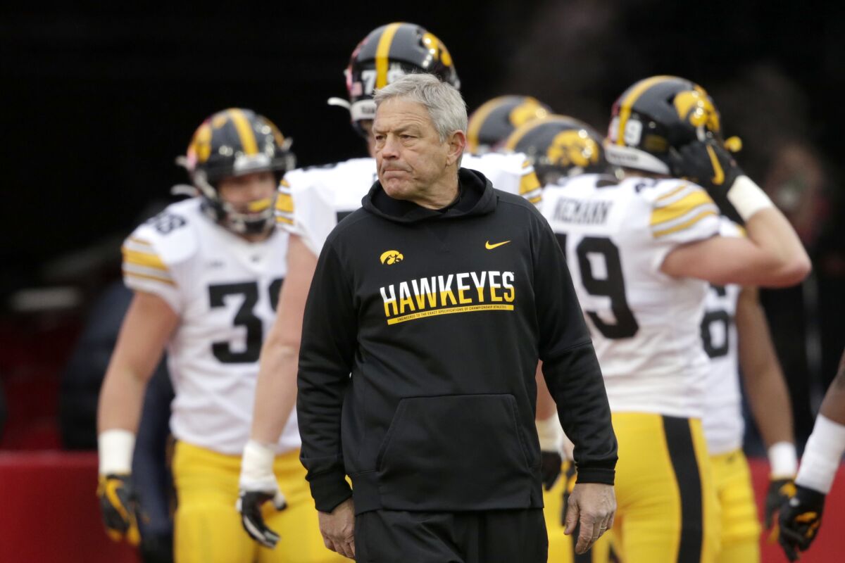 Iowa coach Kirk Ferentz watches warmups