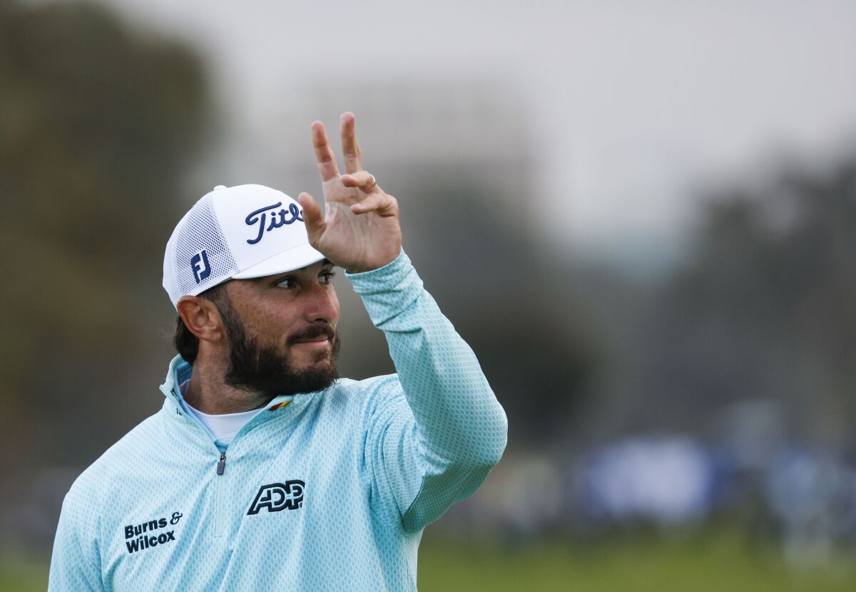Max Homa acknowledges the crowd after his final putt at the Farmers Insurance Open on Saturday.