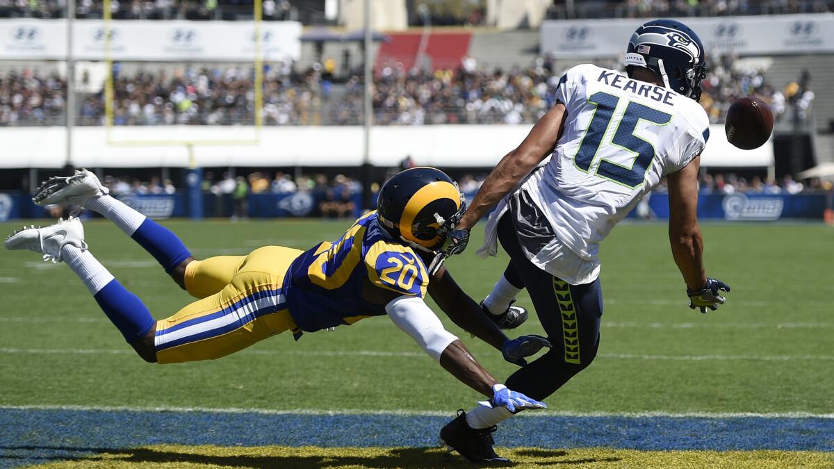 Rams cornerback Lamarcus Joyner prevents a reception by the Seahawks' Jermaine Kearse in the end zone at the Coliseum on Sept. 18, 2016.