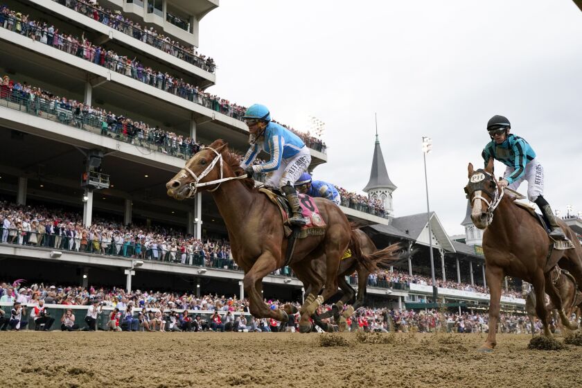 Mage (8), with Javier Castellano aboard, wins the 149th running of the Kentucky Derby horse race at Churchill Downs Saturday, May 6, 2023, in Louisville, Ky. (AP Photo/Jeff Roberson)
