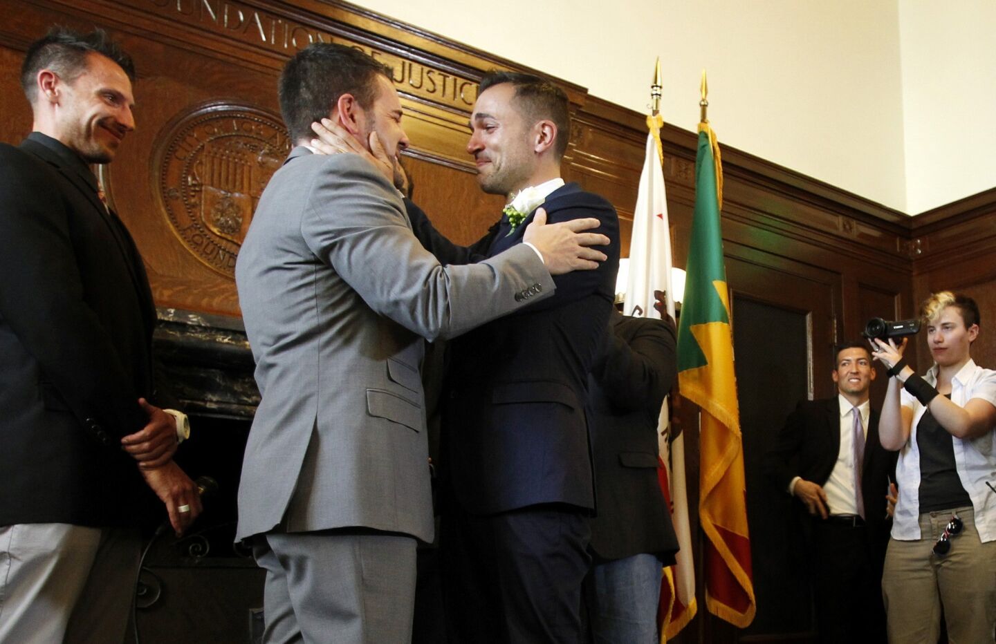 Jeff Zarrillo, left, and Paul Katami are married by Mayor Antonio Villaraigosa at City Hall in downtown Los Angeles after the 9th Circuit Court lifted the stay on same-sex marriage in California.