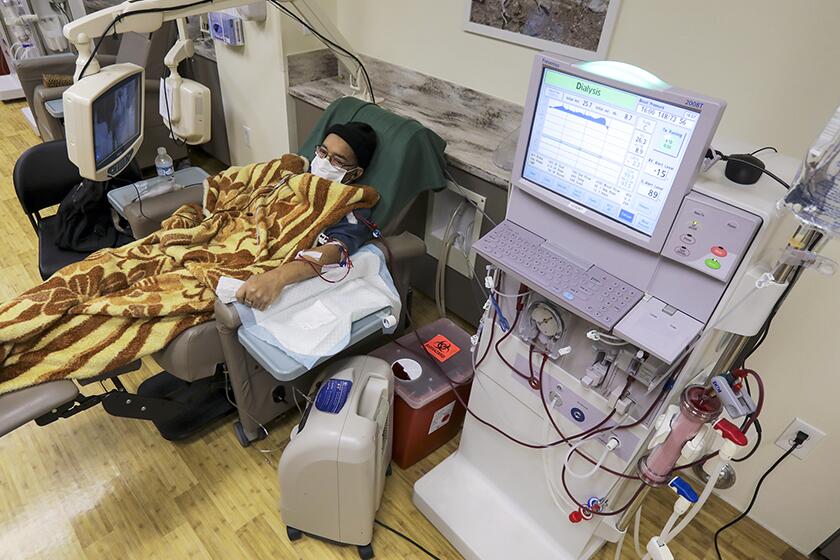A COVID-19 patient at Desert Cities Dialysis in Victorville, Calif.