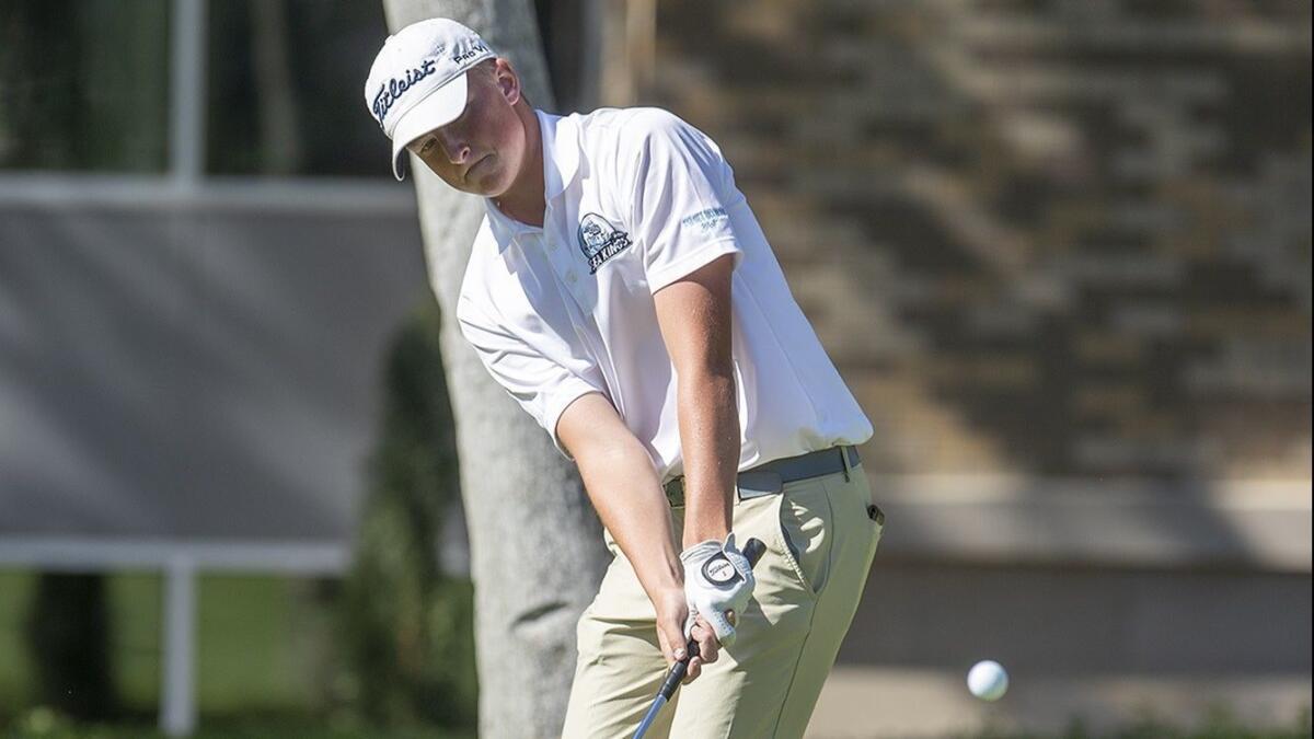 Corona del Mar High's T.J. Jenkins, seen hitting a chip shot on April 18, finished at one-under-par 71 on the first day of the Surf League tournament Monday.