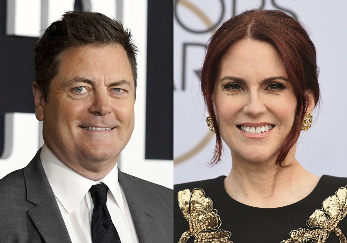 Nick Offerman appears at the premiere of the Netflix series "Colin in Black and White," in Los Angeles on Oct. 28, 2021, left, and Megan Mullally appears at the 25th annual Screen Actors Guild Awards in Los Angeles on Jan. 27, 2019. Offerman is teaming up with his wife Megan Mullally to host the Film Independent Spirit Awards. It will air live IFC and AMC+ on March 6. (Photo by Jordan Strauss/Invision/AP). (AP Photo/Chris Pizzello)