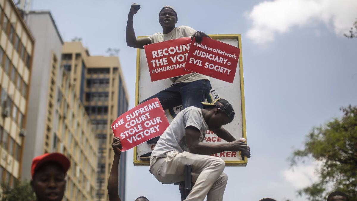 Supporters of Kenyan President Uhuru Kenyatta protest Tuesday against the Supreme Court, which overturned the Aug. 8 presidential election (Dai Kurokawa / EPA-EFE / REX / Shutterstock)