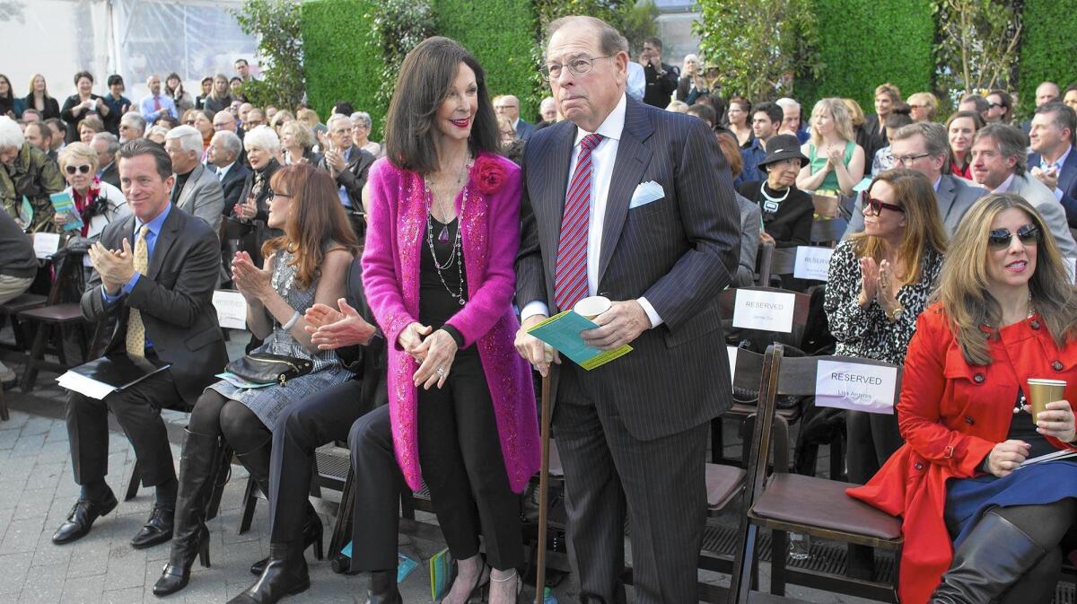 Julianne and George Argyros are recognized during a 2017 ceremony for the plaza that bears their names at the Segerstrom Center for the Arts in Costa Mesa.