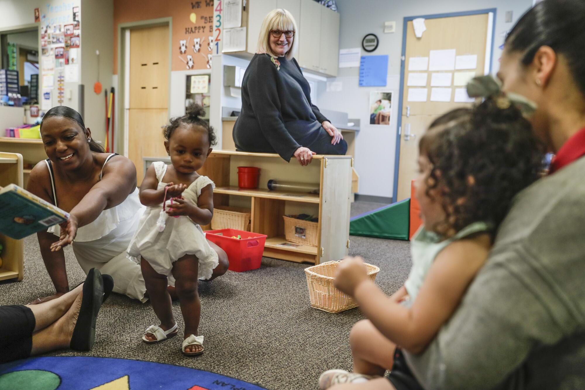 Susie Buffett, daughter Warren Buffett, visits Educare Omaha.