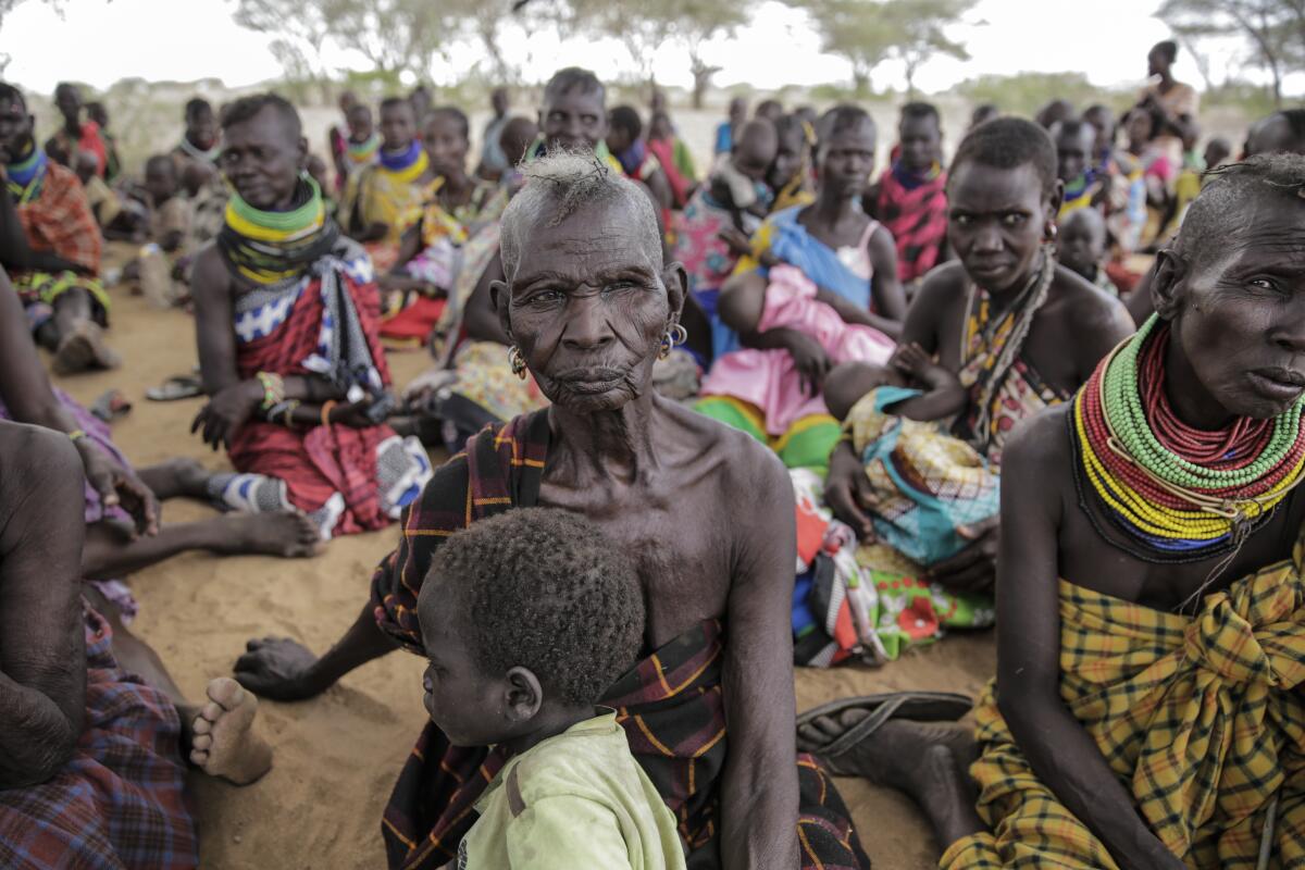 Villagers gather Lomoputh in northern Kenya.