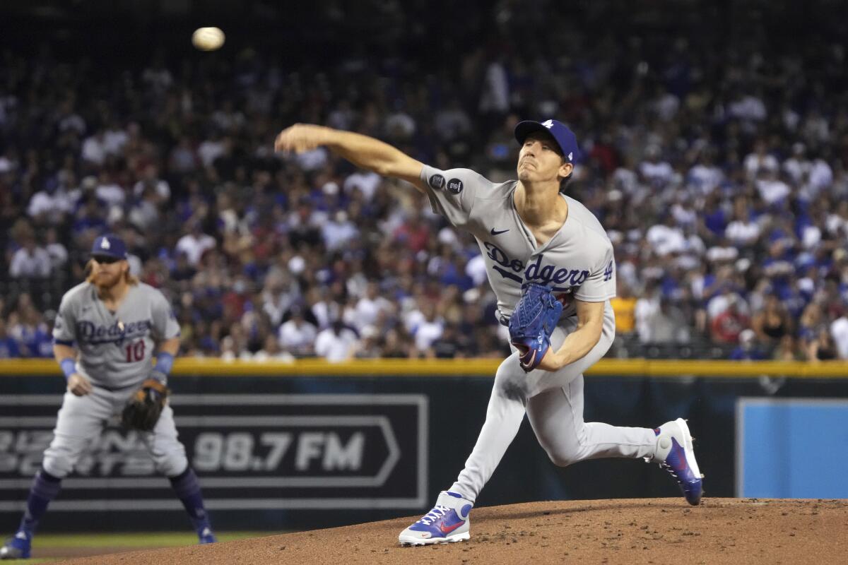 The Dodgers' Walker Buehler pitches during the first inning June 19, 2021, in Phoenix.
