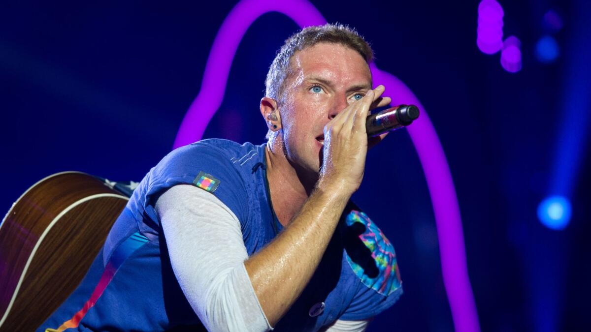 Coldplay singer Chris Martin performs at the Rose Bowl in August 2016.