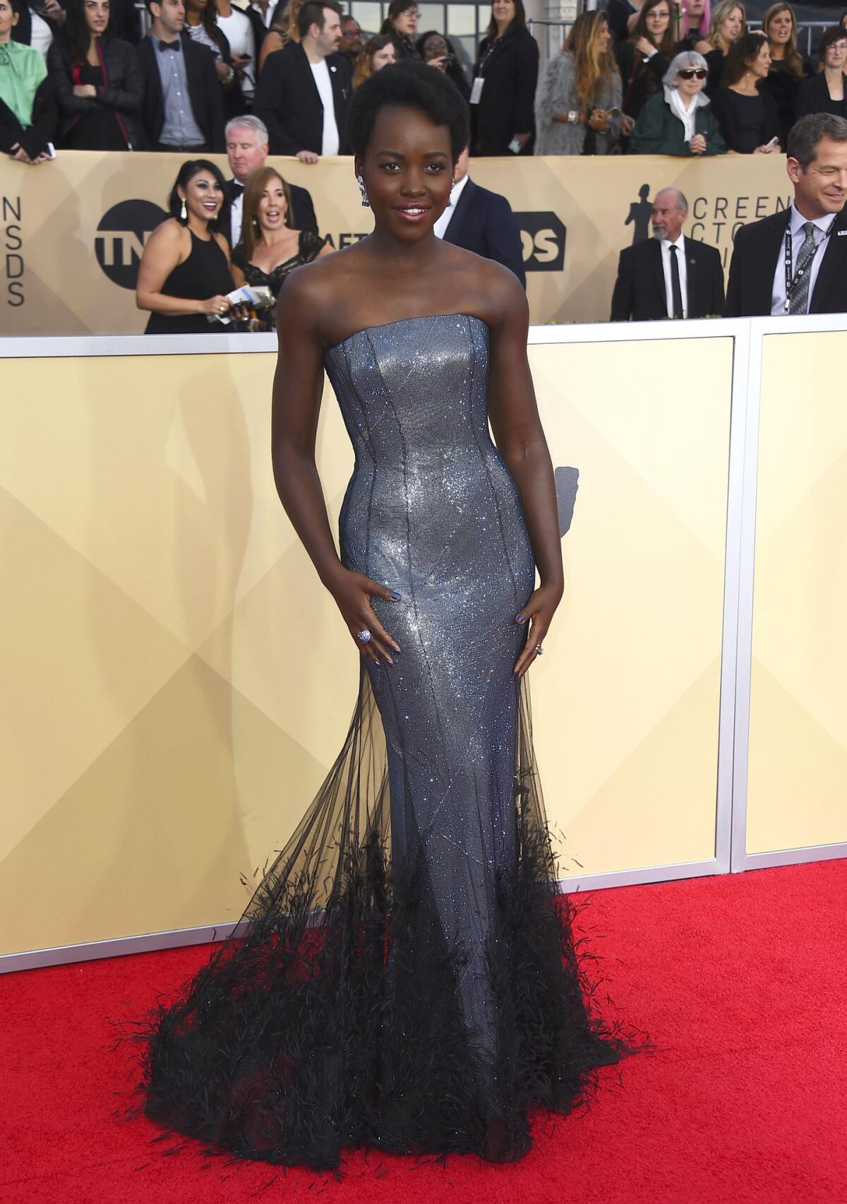 Lupita Nyong'o arrives at the 24th annual Screen Actors Guild Awards at the Shrine Auditorium & Expo Hall on Sunday, Jan. 21, 2018, in Los Angeles. (Photo by Jordan Strauss/Invision/AP)