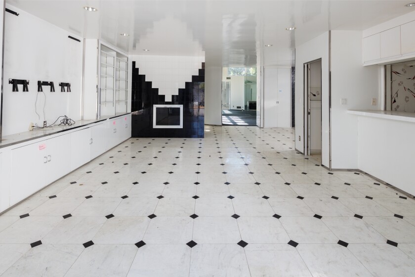 Found a few blocks from the beach, the quarter-acre property includes a single-story fixer-upper, a guesthouse and a backyard with a pool and spa.