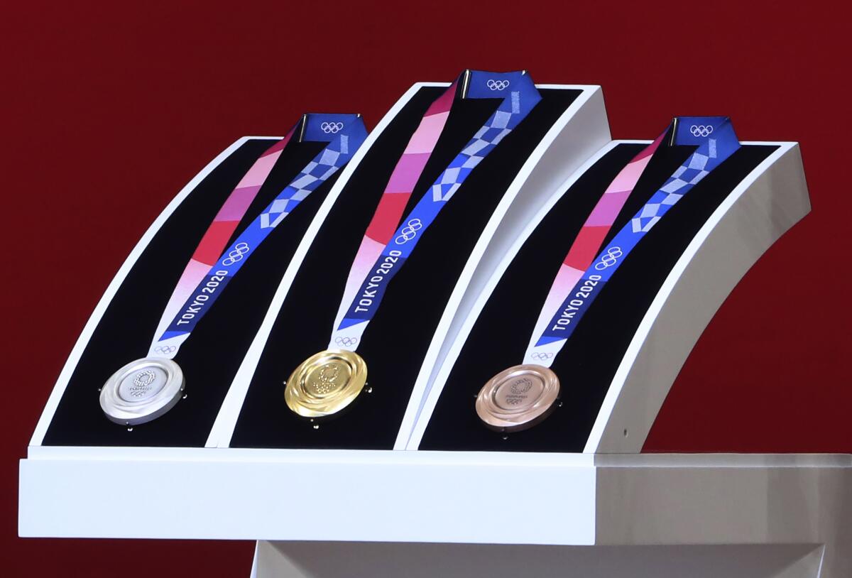 The Tokyo Olympic silver, gold and bronze medals.