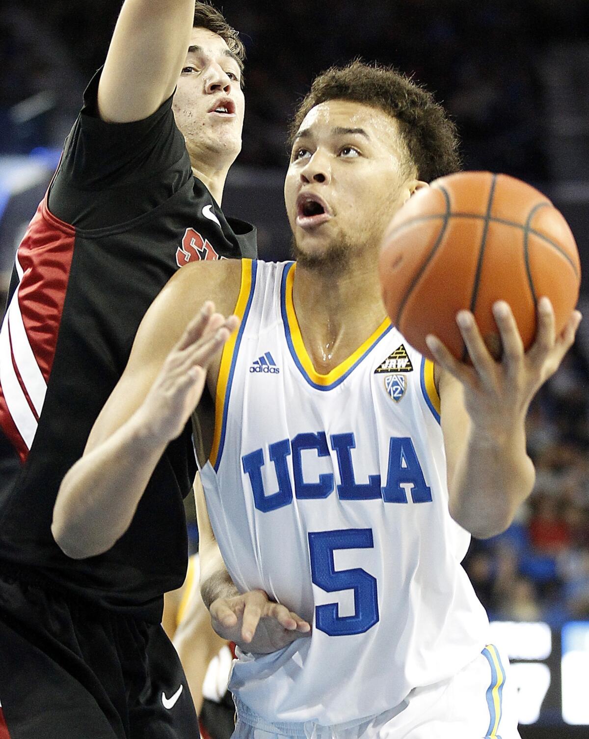 UCLA's Kyle Anderson, seen here in a game against Stanford last season, finished with 22 points and 12 rebounds in a 109-79 preseason win over Cal State San Marcos on Monday.
