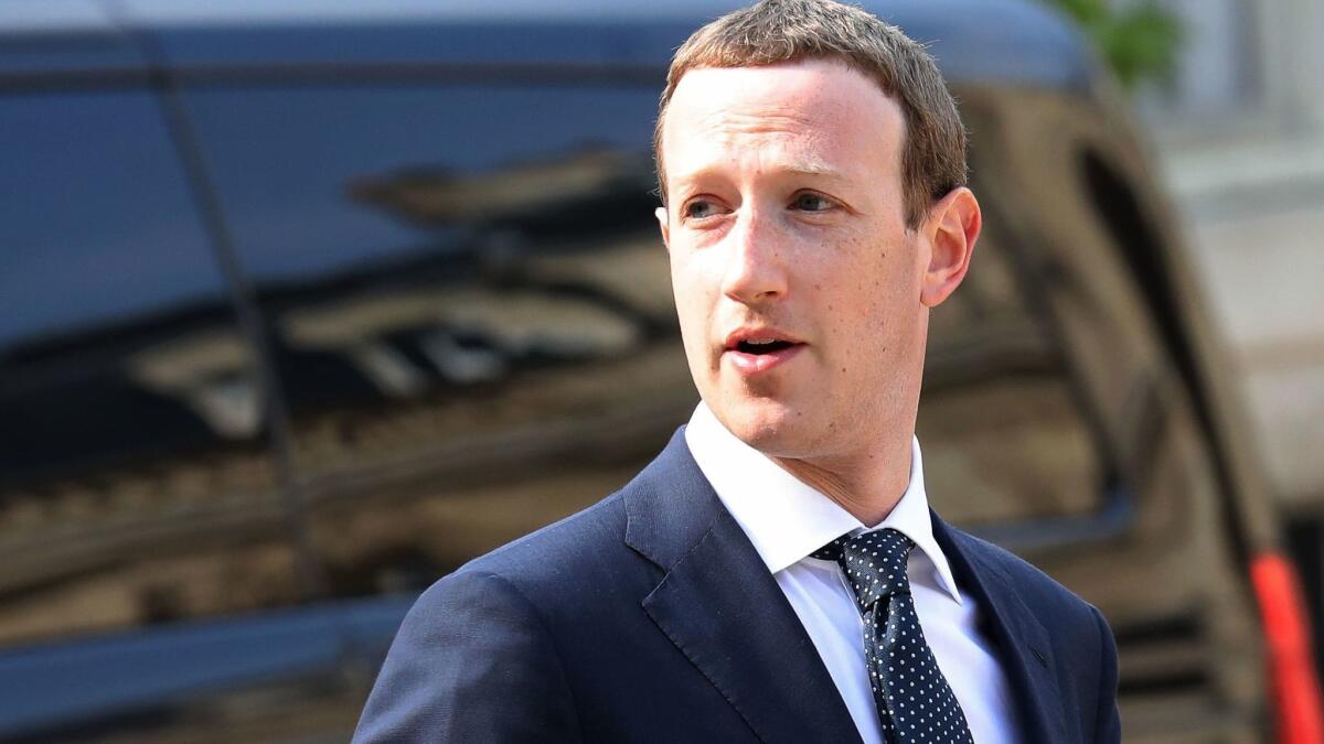 Facebook CEO Mark Zuckerberg, shown in May, said he only learned that his company had hired right-wing political consulting firm Definers Public Affairs when he read the New York Times report published Wednesday.