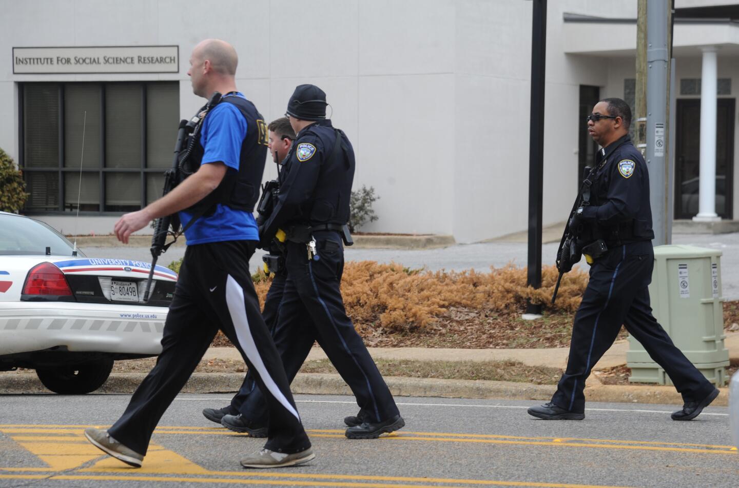 Law enforcement respond to the Alabama Credit Union on reports of a hostage standoff in Tuscaloosa, Ala., on Jan. 10, 2017.
