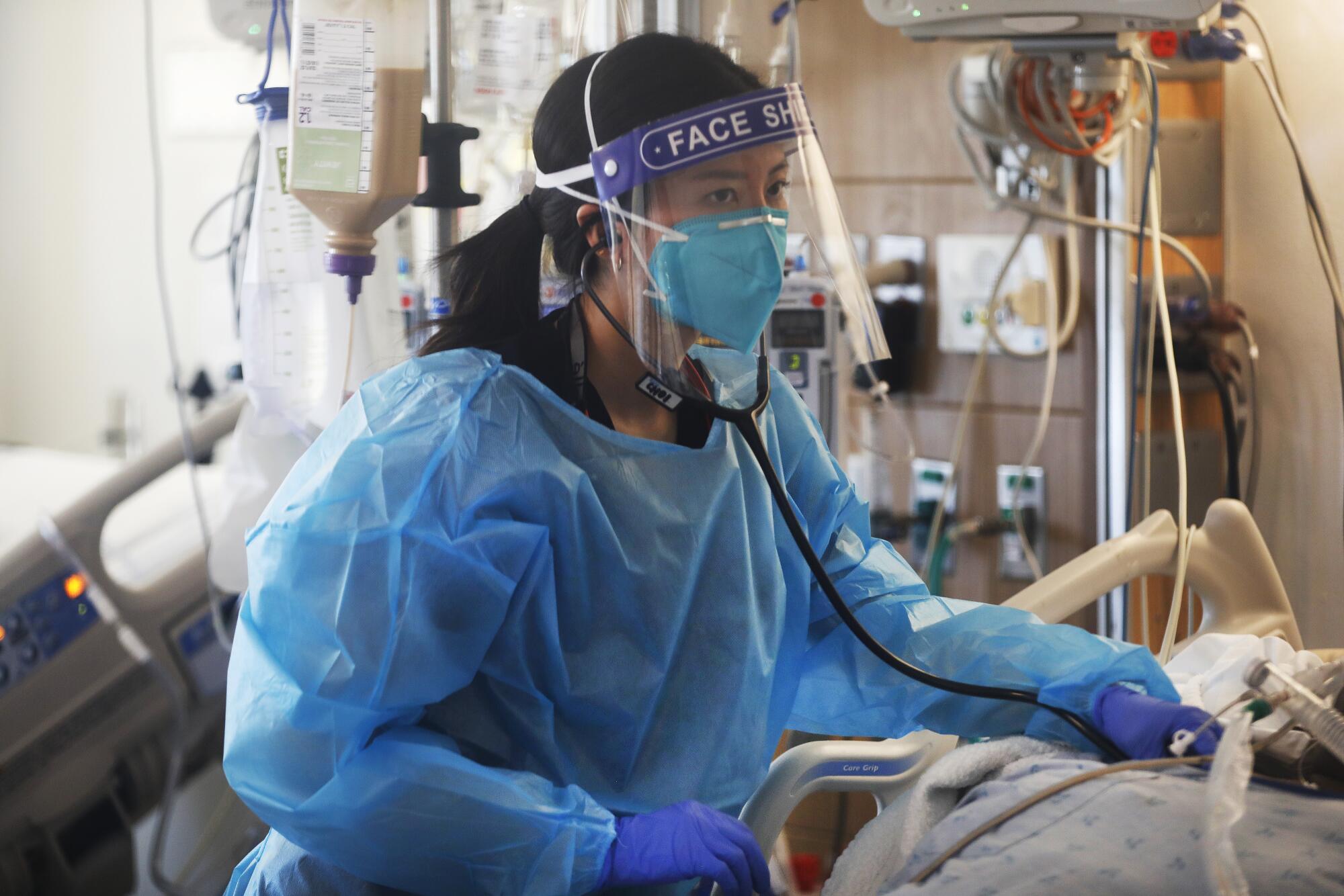 Dr. Christine Choi treating a patient