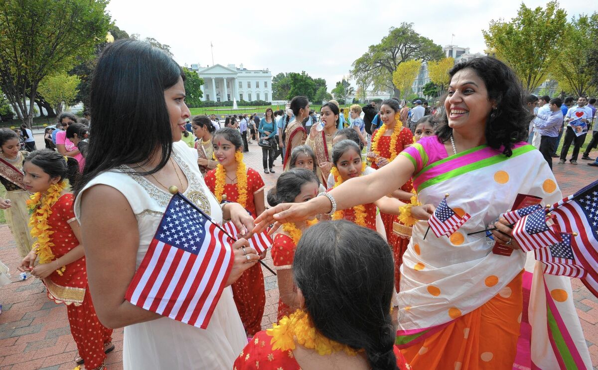 Indian people gather outside the White House during Indian Prime Minister Narendra Modi's visit.